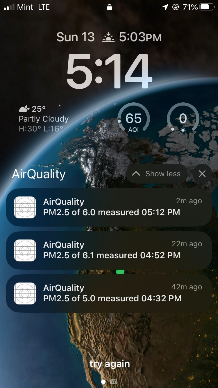 A photo showing notifications received by an iOS device twenty minutes apart alerting the user that air quality has exceeded WHO guidelines.