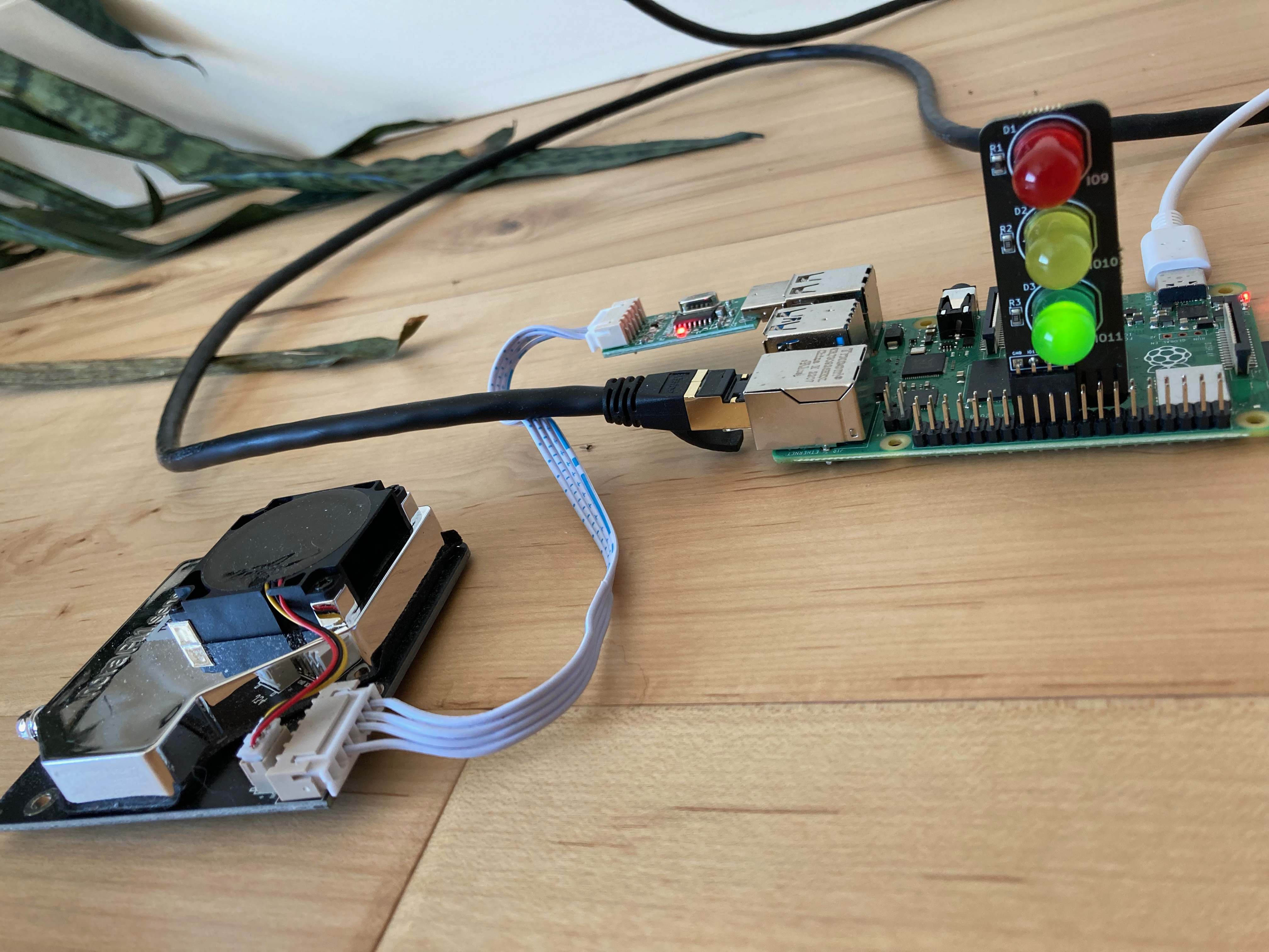 A photo showing the LED light strip with green light illuminated before an offensive air quality measurement